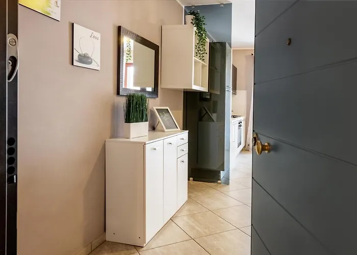 Апартаменты Casa Alice Con Ampio Balcone E Posto Auto